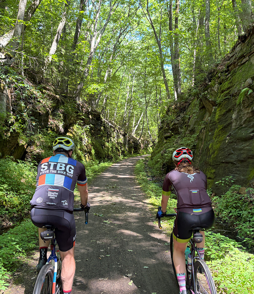 Steve and Sophie riding on a rail trail